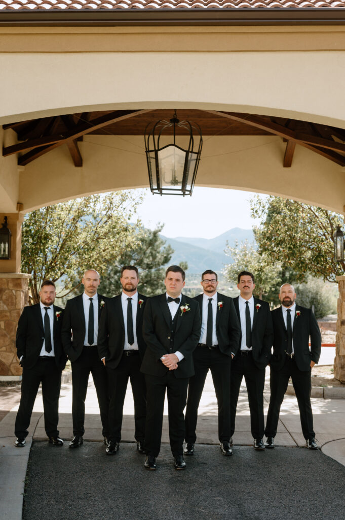 groomsmen posing at Colorado Springs wedding venue