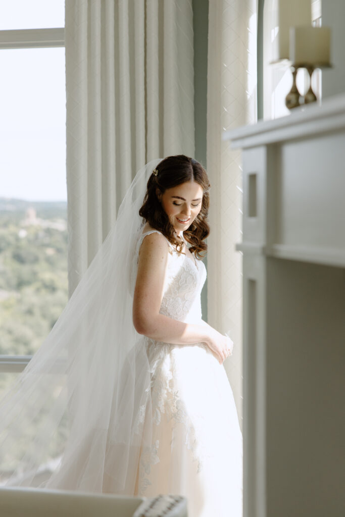 bridal portrait in getting ready room with beautiful window light
